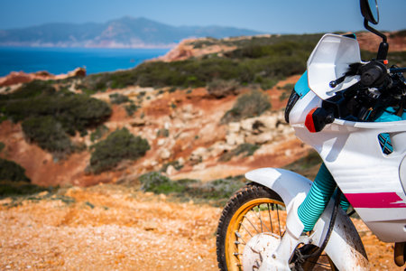 Detail of an adventure bike by the sea in springtimeの写真素材