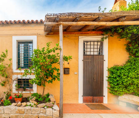 Colorful facade of a beautiful house in Sardinia, Italyの写真素材