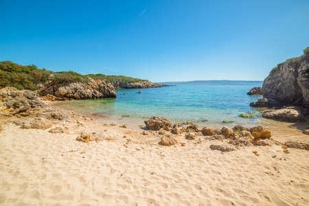 Blue sky over a small cove in Alghero. Sardinia, Italyの写真素材