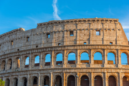 World famous Colosseum under a blue sky. Rome, Italy