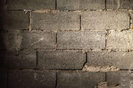 Grunge grey brick wall backgroundの写真素材