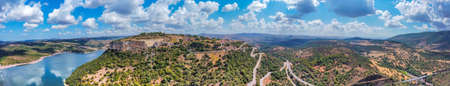 Panoramic view of Monteleone Roccadoria and surrounding area under a blue sky. Sardinia, Italyの写真素材