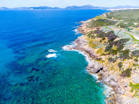 Aerial view of Alghero southern shore on a sunny day. Sardinia, Italyの写真素材