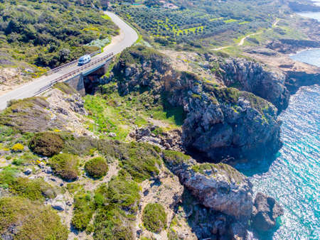 Aerial view of a coastal road in Sardinia, Italyの写真素材