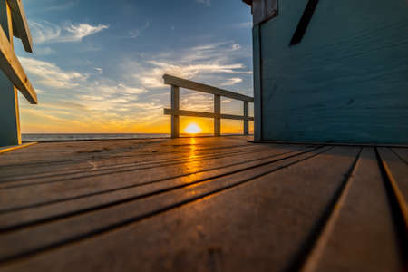 Sunset seen from a lifeguard tower in Malibu. California, USAの写真素材