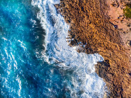 Aerial view of waves and rocks in Alghero southern shore. Sardinia, Italyの写真素材