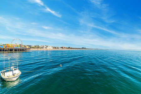 Boat moored by Santa Monica amusement park. California, USAの写真素材