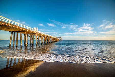 World famous Malibu Surfrider beach at sunset. California, USAの写真素材