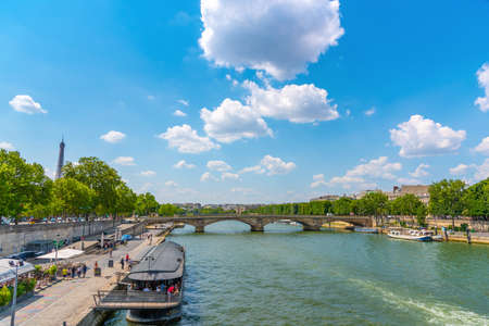 Paris, France - July 06, 2018: Clouds over Seine river in downtown Parisのeditorial素材
