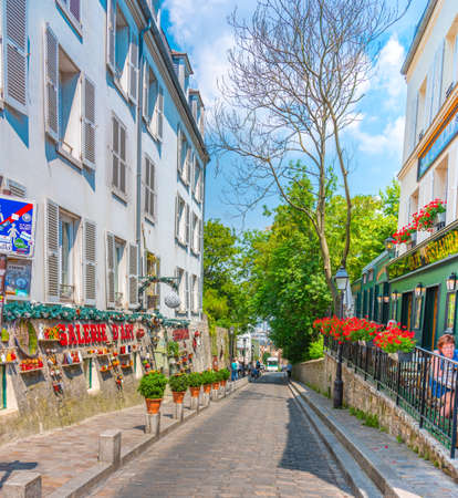 Paris, FR - July 07, 2018: Picturesque street in world famous Montmartre neighborhoodのeditorial素材