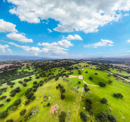 Aerial view of sardinian countryside under a cloudy sky, Italyの写真素材