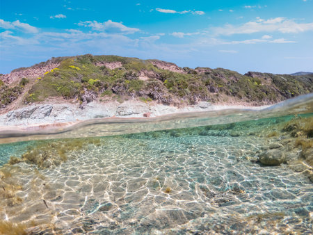 Split underwater view of La Speranza beach. Sardinia, Italyの写真素材