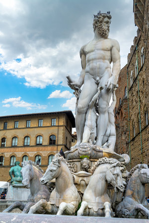 Close up of Neptune Statue in Piazza della Signoria on a cloudy day. Florence, Italyの写真素材