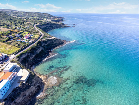 Crystal clear water in Lu Bagnu shoreline seen from above. Sardinia, Italyの写真素材
