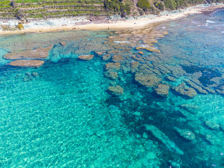 Man alone at the beach in Sardinia, Italyの写真素材