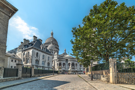 Sacre Coeur cathedral in Paris under a blue sky, Franceの写真素材