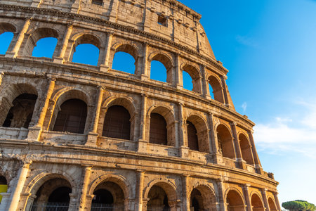 World famous Coliseum under a blue sky. Rome, Italyの写真素材