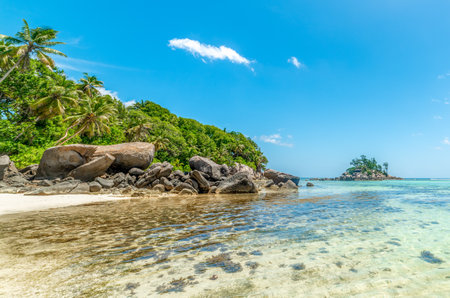 Anse Royaly shore on a sunny day. Mahe island, Seychellesの写真素材