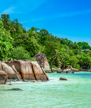 Anse citron under a blue sky. Praslin island, Seychellesの写真素材