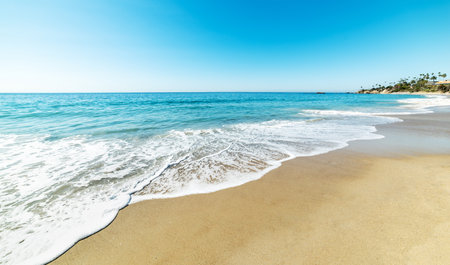 Blue sea and white sand in Laguna Beach. California, USAの写真素材