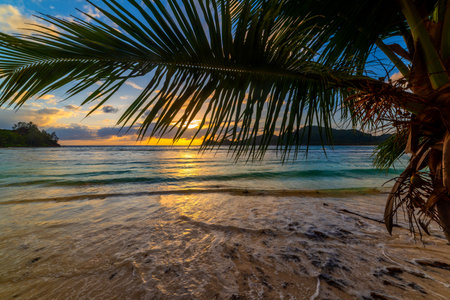 Colorful sunset in Baie Lazare. Mahe island, Seychellesの写真素材