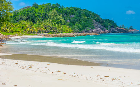 Anse Kerlan beach under a blue sky. Praslin island, Seychellesの写真素材