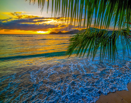 Sunset in Baie Lazare beach. Mahe island, Seychellesの写真素材