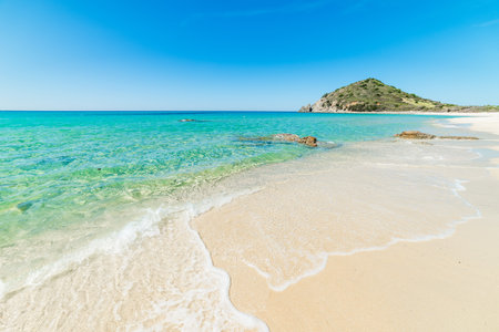 Golden sand in Cala Monte Turno, Sardiniaの写真素材