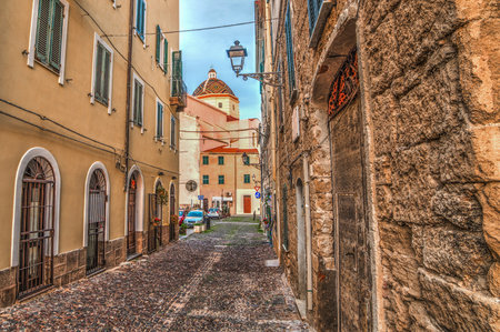 Narrow street in Alghero old town, Sardiniaの写真素材