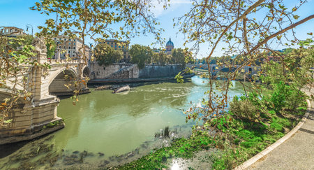 Tiber river under a shining sun in Rome, Italyの写真素材