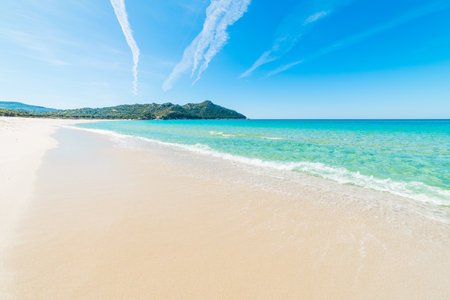 Turquoise water in Cala Sinzias shore, Sardiniaの写真素材