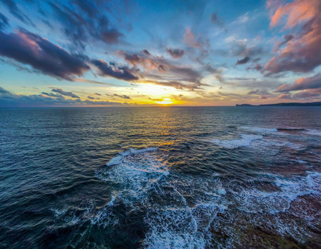 Colorful clouds over Alghero shore at sunset. Sardinia, Italyの写真素材