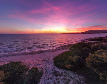 Colorful sunset in Maria Pia beach. Sardinia, Italyの写真素材