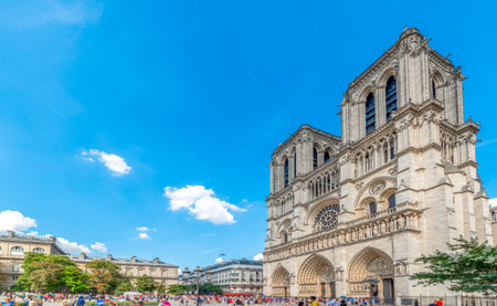 World famous Notre Dame cathedral on a sunny day. Paris, Franceの写真素材