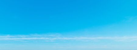 Blue and white sky on a sunny day in springtime