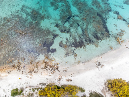 Turquoise water and white sand seen from above. Sardinia, Italy