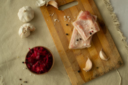 Bacon on a wooden boardの写真素材