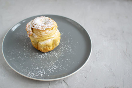 Cruffins is a hybrid of croissant and muffin. Tasty and fragrant pastries, with an unusual appearance.の写真素材