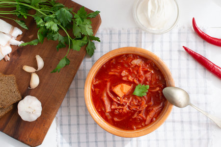 Red borsch. Ukrainian food. Rustic style.Red beetroot soup with beetroot, served with sour cream...