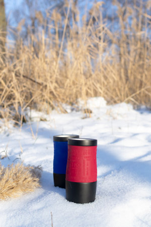 An ice-hole on a frozen river. A dip near the city. Ice bathing concept. Horizontal orientation.の写真素材