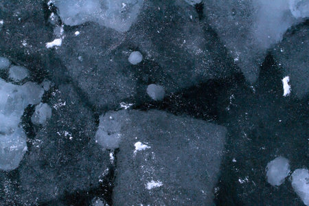 Abstract texture of ice and snow on the lake. Background texture. Horizontal orientation.
