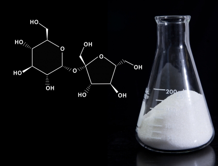 Erlenmeyer flask with sugar and molecular formula for sucroseの写真素材