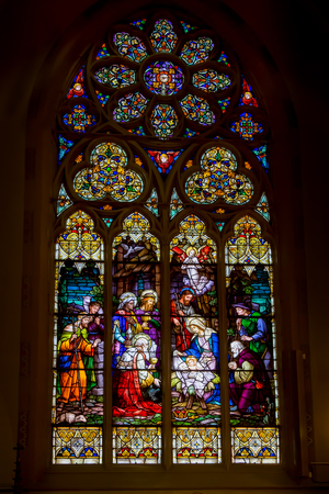 Stained glass window depicting the Nativity, the birth of Christ.  St. John Nepomuk churchのeditorial素材
