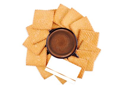 cookie and a cup of coffee and card on a white backgroundの写真素材