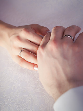 Wedding rings on newly married hands