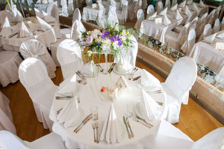 wedding banquet table with flower decorationの写真素材