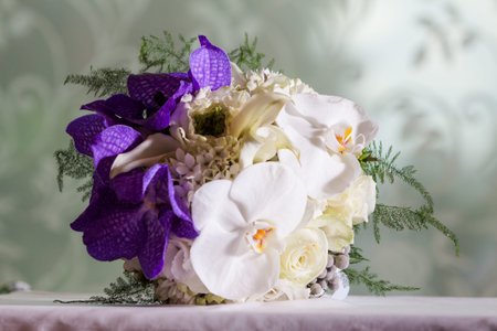 wedding bouquet made from white and purple orchidの写真素材