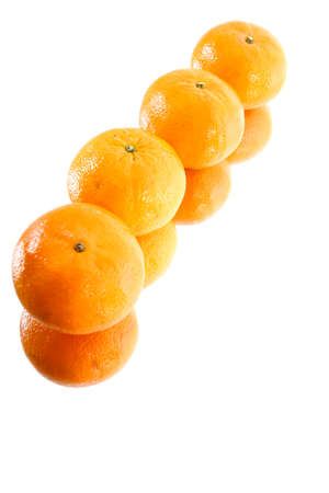 four tangerine on Mirror Surfaceの写真素材