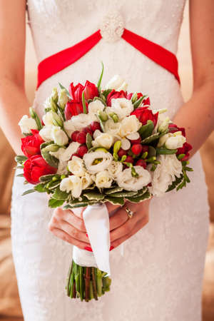 the bride holding her wedding  bouquetの写真素材