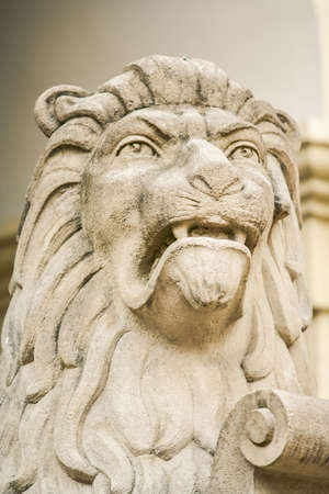 closeup large lion head sculptured from stone symbolises city of Lviv armorial bearingsの写真素材